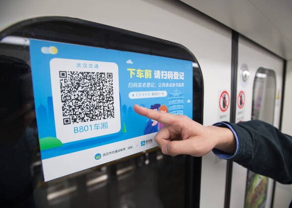 (200323) -- WUHAN, March 23, 2020 -- A staff displays the QR code for real-name registration on a subway carriage at a train depot in Wuhan, central China s Hubei Province, March 23, 2020. Wuhan is making preparations for restoring the operation of public transportation. The public need to go through real-name registration for taking public transportation or taxis in Wuhan, capital of central China s Hubei Province, authorities said Sunday. ) CHINA-HUBEI-WUHAN-PUBLIC TRANSPORTATION SYSTEM-PREPARATION-OPERATION RESTORATION (CN) XiaoxYijiu 