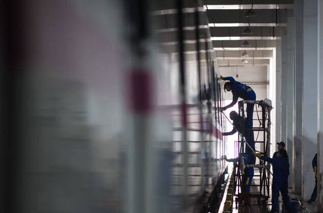 (200323) -- WUHAN, March 23, 2020 -- Staff members conduct cleaning for a subway train at a train depot in Wuhan, central China s Hubei Province, March 23, 2020. Wuhan is making preparations for restoring the operation of public transportation. The public need to go through real-name registration for taking public transportation or taxis in Wuhan, capital of central China s Hubei Province, authorities said Sunday. ) CHINA-HUBEI-WUHAN-PUBLIC TRANSPORTATION SYSTEM-PREPARATION-OPERATION RESTORATION (CN) XiaoxYijiu 
