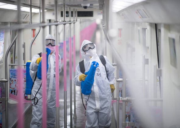 (200323) -- WUHAN, March 23, 2020 -- Staff members conduct disinfection on the subway train at a train depot in Wuhan, central China s Hubei Province, March 23, 2020. Wuhan is making preparations for restoring the operation of public transportation. The public need to go through real-name registration for taking public transportation or taxis in Wuhan, capital of central China s Hubei Province, authorities said Sunday. ) CHINA-HUBEI-WUHAN-PUBLIC TRANSPORTATION SYSTEM-PREPARATION-OPERATION RESTORATION (CN) XiaoxYijiu 