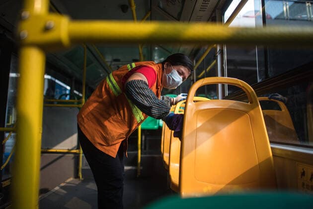 (200323) -- WUHAN, March 23, 2020 -- Zhao Zhenxiang of Wuhan public transportation group disinfects a bus at the bus terminal in Wuhan, central China s Hubei Province, March 23, 2020. Wuhan is making preparations for restoring the operation of public transportation. The public need to go through real-name registration for taking public transportation or taxis in Wuhan, capital of central China s Hubei Province, authorities said Sunday. ) CHINA-HUBEI-WUHAN-PUBLIC TRANSPORTATION SYSTEM-PREPARATION-OPERATION RESTORATION (CN) XiaoxYijiu 