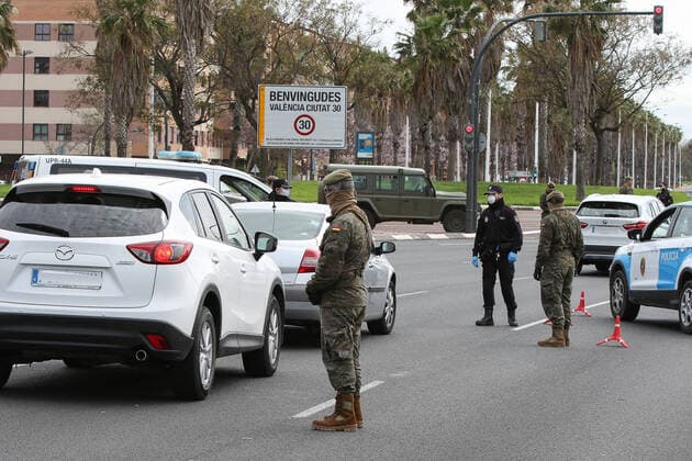 March 23, 2020, Valencia, VALENCIA, SPAIN: Illustration, Military and National Police carry out a control at one of the entrances to Valencia during the second week after the Government declared the state of alarm in Spain and recommended people to stay at home to fight coronavirus COVID-19 on March 23, 2020 in Valencia, Spain Valencia SPAIN - ZUMAa181 20200323_zaa_a181_068 Copyright: xIvanxTerronx