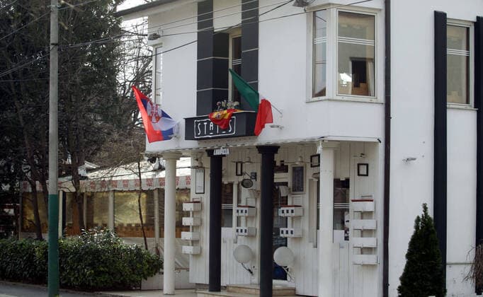 23.03.2020 Belgrade(Serbia) Life pandemia corona virus Cafe status closed by decision of Serbian government of state of emergency of corona virus in Belgrade community Zemun. With flags of Spain and Italy in solidarity with their victims of corona virus.Serbia like country from today has 249 infected persons of corona virus and two dead case. 