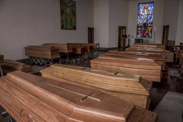 Cremona. Church used as a waiting room for coffins at the Cremona Hospital emergency COVID19 Coronavirus (Carlo Cozzoli Fotogramma, Cremona - 2020-03-23) p.s. la foto e utilizzabile nel rispetto del contesto in cui e stata scattata, e senza intento diffamatorio del decoro delle persone rappresentate  Copyright: xCarloxCozzolix xFOTOGRAMMAx