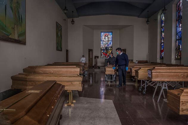 Cremona. Church used as a waiting room for coffins at the Cremona Hospital emergency COVID19 Coronavirus (Carlo Cozzoli Fotogramma, Cremona - 2020-03-23) p.s. la foto e utilizzabile nel rispetto del contesto in cui e stata scattata, e senza intento diffamatorio del decoro delle persone rappresentate  Copyright: xCarloxCozzolix xFOTOGRAMMAx