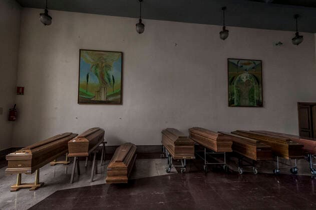 Cremona. Church used as a waiting room for coffins at the Cremona Hospital emergency COVID19 Coronavirus (Carlo Cozzoli Fotogramma, Cremona - 2020-03-23) p.s. la foto e utilizzabile nel rispetto del contesto in cui e stata scattata, e senza intento diffamatorio del decoro delle persone rappresentate  Copyright: xCarloxCozzolix xFOTOGRAMMAx