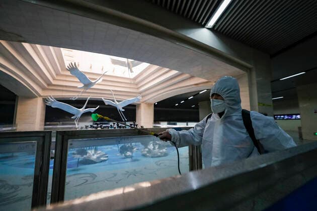 (200323) -- WUHAN, March 23, 2020 -- A staff conducts disinfection at the subway station of Hankou Railway Station in Wuhan, central China s Hubei Province, March 23, 2020. Wuhan is making preparations for restoring the operation of public transportation. The public need to go through real-name registration for taking public transportation or taxis in Wuhan, capital of central China s Hubei Province, authorities said Sunday. ) CHINA-HUBEI-WUHAN-PUBLIC TRANSPORTATION SYSTEM-PREPARATION-OPERATION RESTORATION (CN) ShenxBohan 