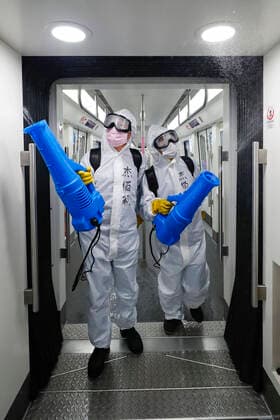 (200323) -- WUHAN, March 23, 2020 -- Staff members conduct disinfection on the subway train at a train depot in Wuhan, central China s Hubei Province, March 23, 2020. Wuhan is making preparations for restoring the operation of public transportation. The public need to go through real-name registration for taking public transportation or taxis in Wuhan, capital of central China s Hubei Province, authorities said Sunday. ) CHINA-HUBEI-WUHAN-PUBLIC TRANSPORTATION SYSTEM-PREPARATION-OPERATION RESTORATION (CN) ShenxBohan 