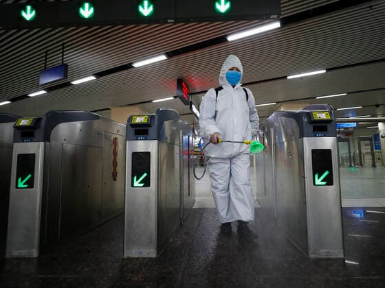 (200323) -- WUHAN, March 23, 2020 -- A staff conducts disinfection at the subway station of Hankou Railway Station in Wuhan, central China s Hubei Province, March 23, 2020. Wuhan is making preparations for restoring the operation of public transportation. The public need to go through real-name registration for taking public transportation or taxis in Wuhan, capital of central China s Hubei Province, authorities said Sunday. ) CHINA-HUBEI-WUHAN-PUBLIC TRANSPORTATION SYSTEM-PREPARATION-OPERATION RESTORATION (CN) ShenxBohan 