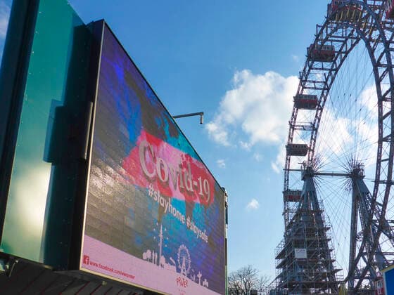 advertising video wall with COVID-19 warning, Ferris Wheel at Prater closed due to corona virus (COVID-19) Wien, Vienna Wien Austria 02. Leopoldstadt