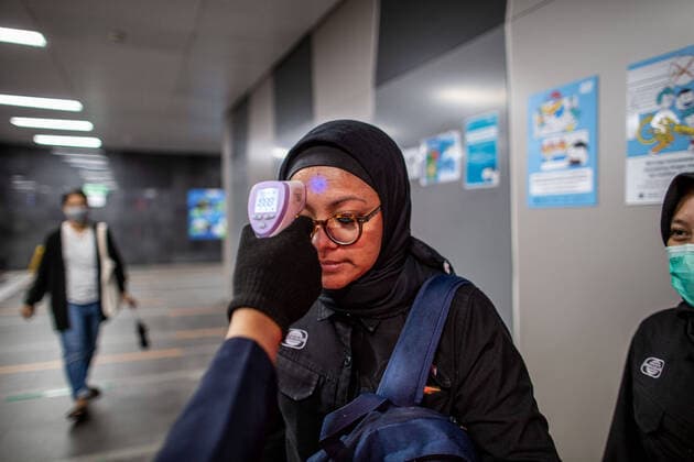 March 23, 2020, Jakarta, Jakarta, Indonesia: Jakarta, Indonesia, 23 March 2020 : Temperature Check Continue implemented at MRT Station Jakarta as Part of Preventing possible people with Positive Corona Virus with hight Temperature enter the station. Jakarta Indonesia - ZUMAh128 20200323_zap_h128_045 Copyright: xDonalxHusnix