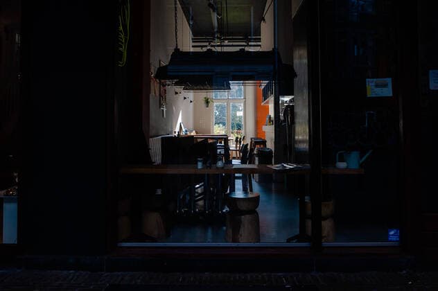 March 23, 2020, Amsterdam, Netherlands: A view of a restaurant closed due to the spread of the coronavirus..Since the Coronavirus hit The Netherlands, most of the cities are empty. A couple of weeks ago, Prime Minister Mark Rutte called to work from home as much as possible and also announced the closure of restaurants, sports clubs, sex clubs, saunas, and cafes. Amsterdam is not formally in lockdown, but the streets and squares are empty. Amsterdam Netherlands - ZUMAs197 20200323_zaa_s197_054 Copyright: xAnaxFernandezx