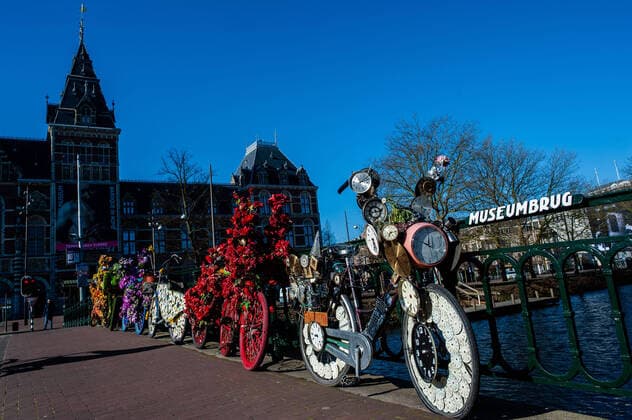 March 23, 2020, Amsterdam, Netherlands: A group of bikes are seen decorated with flowers on an empty street..Since the Coronavirus hit The Netherlands, most of the cities are empty. A couple of weeks ago, Prime Minister Mark Rutte called to work from home as much as possible and also announced the closure of restaurants, sports clubs, sex clubs, saunas, and cafes. Amsterdam is not formally in lockdown, but the streets and squares are empty. Amsterdam Netherlands - ZUMAs197 20200323_zaa_s197_060 Copyright: xAnaxFernandezx