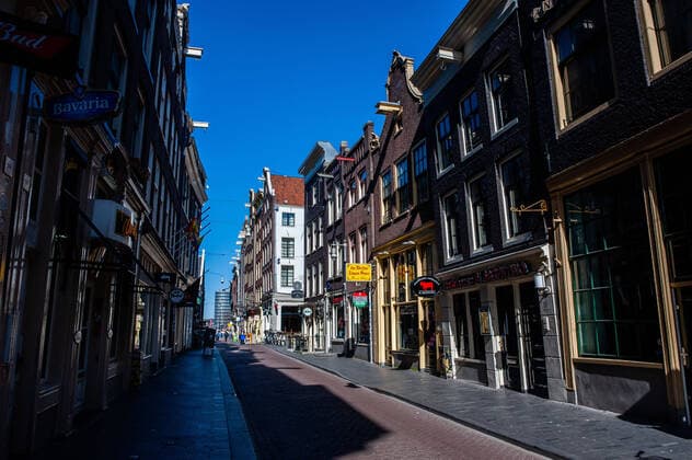March 23, 2020, Amsterdam, Netherlands: A view of an empty street in Chinatown..Since the Coronavirus hit The Netherlands, most of the cities are empty. A couple of weeks ago, Prime Minister Mark Rutte called to work from home as much as possible and also announced the closure of restaurants, sports clubs, sex clubs, saunas, and cafes. Amsterdam is not formally in lockdown, but the streets and squares are empty. Amsterdam Netherlands - ZUMAs197 20200323_zaa_s197_067 Copyright: xAnaxFernandezx