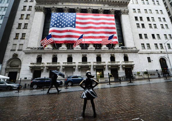 March 23, 2020, New York Manhattan, USA: A man waking through the empty streets of wall St. After NYC Authorities ordered to stay New Yorkers to stay home except for those providing essential services. 03 23 20. New York Manhattan Wall ST. . New York Manhattan USA - ZUMAs252 20200323_znp_s252_022 Copyright: xMarcusxSantosx
