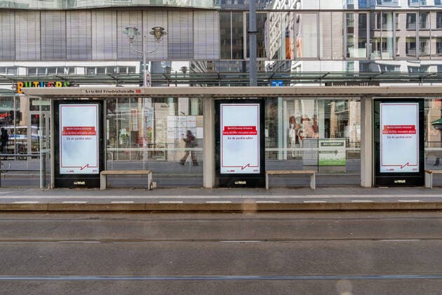 23 03 2020, Berlin, Germany, CEFR Impressions from Berlin during the initial restriction period Information on an advertising board on the coronavirus