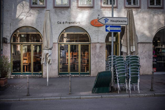 closed cafes in beautiful spring weather Frankfurt at times of rush hour