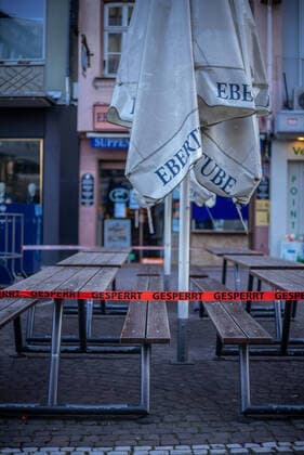 closed seating area of a restaurant in the Fankfurter Fressgasse Frankfurt during rush hour