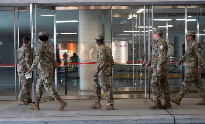 Governor Andrew Cuomo tours Jacob Javits Center Members of the National Guard arrived for Governor Andrew Cuomo address media at Jacob Javits Convention Center where military sets hospitals to help fight coronavirus cases New York New York United States Copyright: LevxRadin