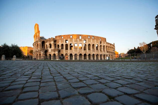 Italy: Rome sites during the Coronavirus outbreak A view of the Colosseum without any person in front of during the 14th day of lockdown imposed nationwide by the Italian government that tries to tackle the coronavirus outbreak. Every movements in the citiies are restricted, and streets usually filled with life and traffic are almost empty Roma Italy Italy Copyright: GiuseppexFama