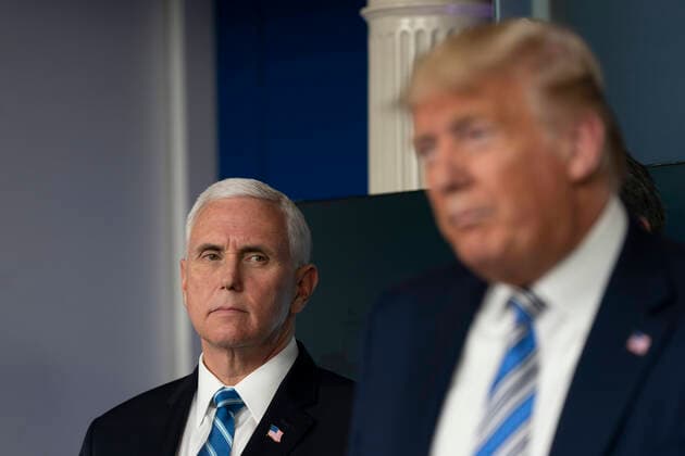 United States Vice President Mike Pence listens as US President Donald J. Trump speaks during a news briefing by members of the Coronavirus Task Force at the White House in Washington, DC on Monday, March 23, 2020. Copyright: xChrisxKleponisx