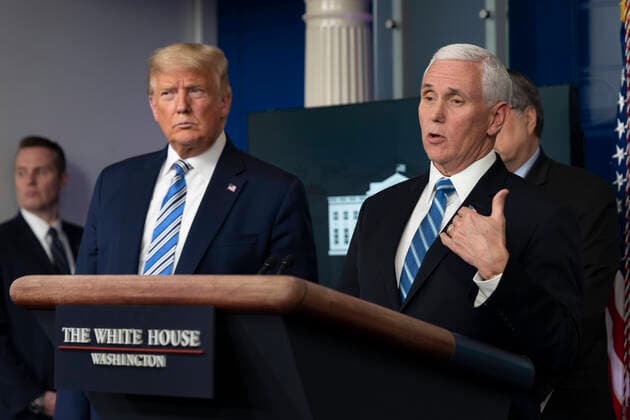 United States Vice President Mike Pence, right, speaks as US President Donald J. Trump, left, listens during a news briefing by members of the Coronavirus Task Force at the White House in Washington, DC on Monday, March 23, 2020. Copyright: xChrisxKleponisx