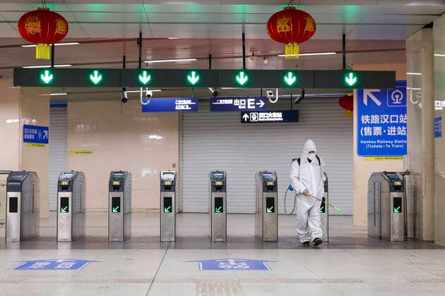 (200324) -- WUHAN, March 24, 2020 -- A staff member conducts disinfection at a subway station in Wuhan, central China s Hubei Province, March 23, 2020. The public need to go through real-name registration for taking public transportation or taxis in Wuhan, capital of central China s Hubei Province, authorities said Sunday. ) CHINA-HUBEI-WUHAN-PUBLIC TRANSPORTATION SYSTEM-PREPARATION-OPERATION RESTORATION (CN) ShenxBohan 