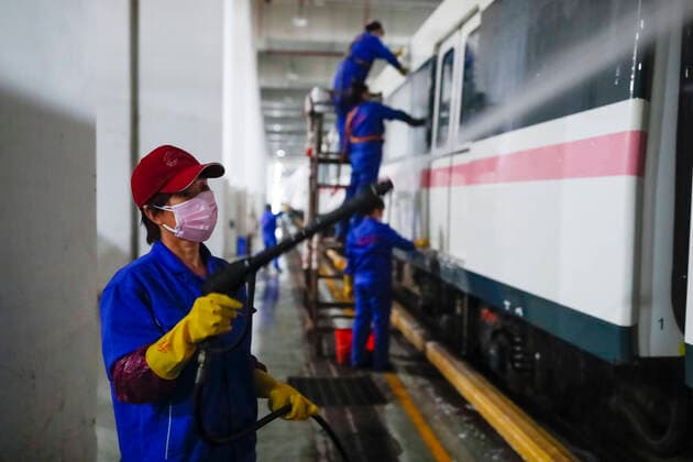 (200324) -- WUHAN, March 24, 2020 -- Staff clean a subway train at a subway train depot in Wuhan, central China s Hubei Province, March 23, 2020. The public need to go through real-name registration for taking public transportation or taxis in Wuhan, capital of central China s Hubei Province, authorities said Sunday. ) CHINA-HUBEI-WUHAN-PUBLIC TRANSPORTATION SYSTEM-PREPARATION-OPERATION RESTORATION (CN) ShenxBohan 