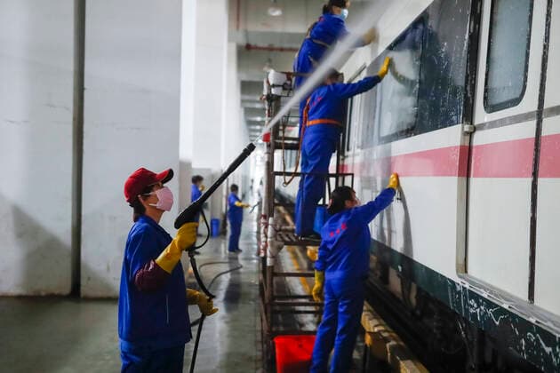 (200324) -- WUHAN, March 24, 2020 -- Staff clean a subway train at a subway train depot in Wuhan, central China s Hubei Province, March 23, 2020. The public need to go through real-name registration for taking public transportation or taxis in Wuhan, capital of central China s Hubei Province, authorities said Sunday. ) CHINA-HUBEI-WUHAN-PUBLIC TRANSPORTATION SYSTEM-PREPARATION-OPERATION RESTORATION (CN) ShenxBohan 