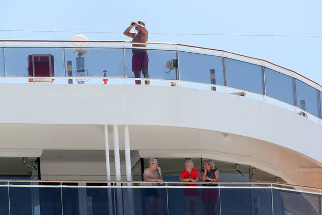 MSC MAGNIFICA PERTH, Passengers are seen onboard the MSC Magnifica cruise ship which is docked in Fremantle harbour in Fremantle on Tuesday March 24, 2020. This ship will refuel before departing for Dubai at 6pm. WA has 140 cases of COVID-19, including two people who are in a critical condition. ( NO ARCHIVING, EDITORIAL USE ONLY, NO USE IN BOOKS WITHOUT CONSENT PERTH WA AUSTRALIA  Copyright: xRICHARDxWAINWRIGHTx 20200324001459066153