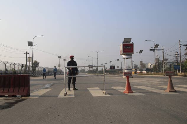 March 24, 2020, Kathmandu, Nepal: Nepalese police personnel stand with a barrier on a road as a lockdown is imposed to slow the rate of the coronavirus disease (COVID-19) spread in Kathmandu, Nepal on Tuesday March 24, 2020. Kathmandu Nepal - ZUMAs242 20200324_zip_s242_004 Copyright: xDipenxShresthax