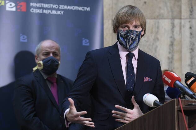 Czech Health Minister Adam Vojtech, right, and Deputy Health Minister and Central Crisis Staff head Roman Prymula, left, with a protection face masks attend a press conference on assessment of development of COVID-19 illness, on March 24, 2020, in Prague, Czech Republic. (CTKxPhoto OndrejxDeml) CTKPhotoP202003240235901 _DML8854