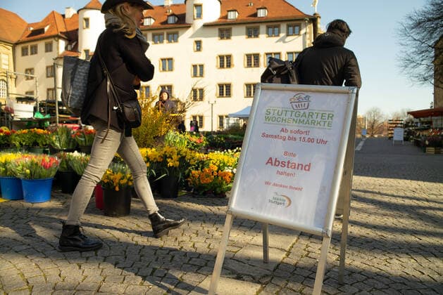 Coronavirus COVID 19 Hope for the end of the corona crisis On information boards of retailers we will be open again from 1 April or June On the weekly market one asks to keep the distance rules Stuttgart Mitte Baden Württemberg Germany Copyright: xLeif-HendrikxPiechowskix