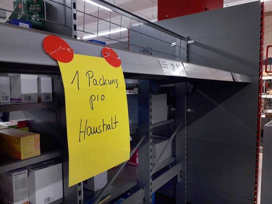 Shopping at a discount store in the Hanover area Empty shelves for hygiene products such as toilet paper and kitchen rolls Purchasing