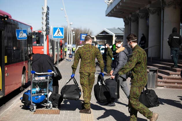 Corrected flight from Hahn Frankfurt. 2020-03-24 Vilnius Lithuania. Passengers of Ryanair flight from Hahn Frankfurt are sent to mandatory 14 days quarantine in state paid premises. Lithuania health minister issued an order starting from 24 of March every person arriving in Lithuania must spend 14 days of mandatory quarantine. Vilnius Lithuania  Copyright: xLukasxBalandisx covid quarantine vilnius lithuania