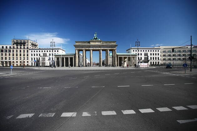 Brandenburg Gate with empty streets in Berlin on 24 March 2020 To slow down the spread of the coronavirus COVID 19, the federal and state governments decided to impose further restrictions After museums, theatres, sports events etc. were banned, meetings with more than two people