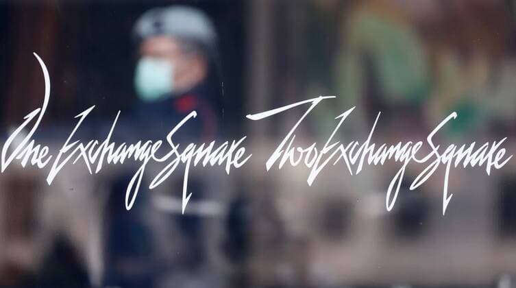March 24, 2020, Hong Kong, CHINA: Masked Security Guard is seen through window of THE EXCHANGE SQUARE in Central, Hong Kong.Mar-24 Hong Kong.ZUMA Hong Kong CHINA - ZUMAl137 20200324_zap_l137_006 Copyright: xLiauxChung-renx