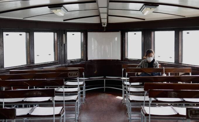 March 24, 2020, Hong Kong, CHINA: Masked lone passenger on the STAR FERRY, under the fear of coronavirus infection in the City.Mar-24,2020 Hong Kong.ZUMA Hong Kong CHINA - ZUMAl137 20200324_zap_l137_011 Copyright: xLiauxChung-renx