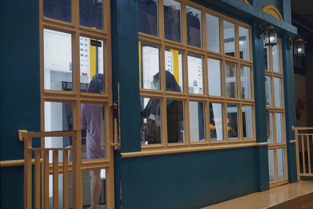 March 24, 2020, Makassar, South Sulawesi, Indonesia: The woman who wore a mask was in an ATM machine on the ground floor of the Ratu Indah Mall in Makassar City, South Sulawesi Province, Indonesia. This woman wears a mask to protect herself from the spread of coronavirus. Makassar Indonesia - ZUMAb223 20200324_zip_b223_013 Copyright: xHerwinxBaharx