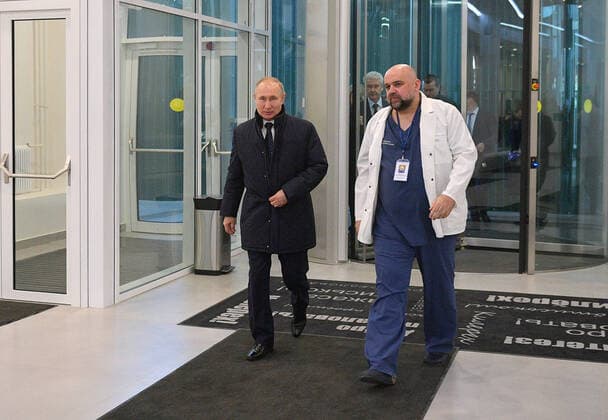 MOSCOW, RUSSIA - MARCH 24, 2020: Chief physician Denis Protsenko (R) shows round Russia s President Vladimir Putin on his visit to the Novomoskovsky multipurpose medical center for patients suspected of the COVID-19 coronavirus infection. Alexei Druzhinin Russian Presidential Press and Information Office TASS  TS0D336E
