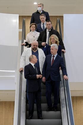MOSCOW, RUSSIA - MARCH 24, 2020: Russia s President Vladimir Putin and Moscow Mayor Sergei Sobyanin (L-R front) followed by chief physician Denis Protsenko, Russia s Deputy Prime Minister Tatyana Golikova (L-R 2nd row), Chief State Sanitary Physician Anna Popova (L 3rd row), Presidential Spokesman Dmitry Peskov and Healthcare Minister Mikhail Murashko (L-R back) on their visit to the Novomoskovsky multipurpose medical center for patients suspected of the COVID-19 coronavirus infection. Alexei Druzhinin Russian Presidential Press and Information Office TASS  TS0D3379