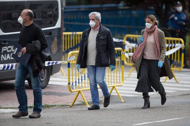 March 24, 2020, Madrid, MADRID, SPAIN: Details of the movements of security officers in the morgue installed in the Ice Palace during tennth day after the Government declared the state of alarm in Spain and recommended people to stay at home to fight coronavirus COVID-19 on March 24, 2020 in Madrid, Spain Madrid SPAIN - ZUMAa181 20200324_zaa_a181_066 Copyright: xJoaquinxCorcherox