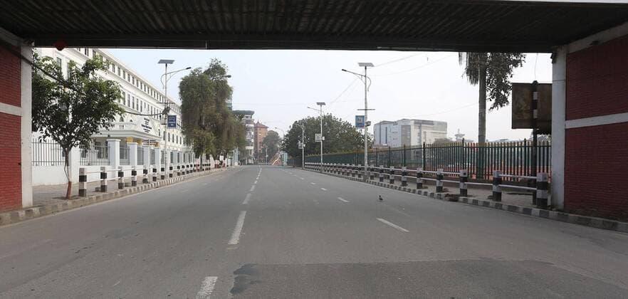 Nepal lockdown to control spreading COVID-19 Deserted street is pictured in Kathmandu during the nationwide lock down in an effort to control of spreading COVID-19 infection.Nepal government announced to enforce a week-long nationwide lock down to prevent and control the spread of COVID-19 infection from March 24. Kathmandu Nepal Copyright: ArchanaxShrestha
