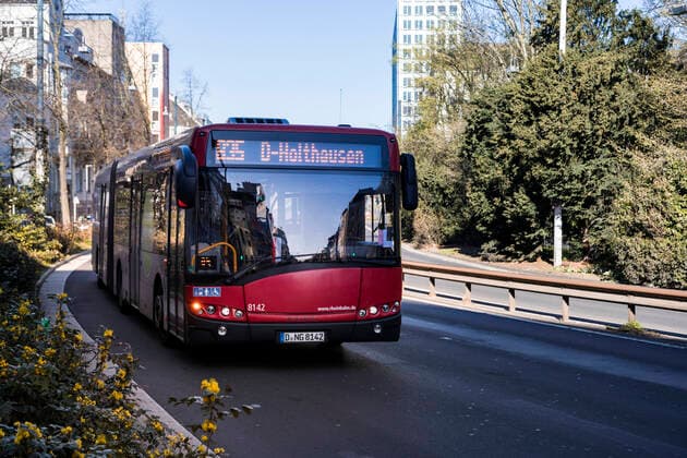 Measures due to coronavirus pandemic, empty city centre of Düsseldorf, access to the Rheinkniebrücke, Rheinbahn operates the buses according to an adapted timetable