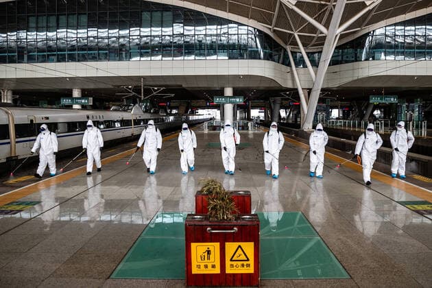 (200324) -- WUHAN, March 24, 2020 -- Firefighters conduct disinfection on the platform of Wuhan Railway Station in Wuhan, central China s Hubei Province, March 24, 2020. Over 70 firefighters conducted a comprehensive disinfection at the railway station on Tuesday. (Photo by Xinhua) CHINA-HUBEI-WUHAN-RAILWAY STATION-DISINFECTION (CN) HexHanqiu 