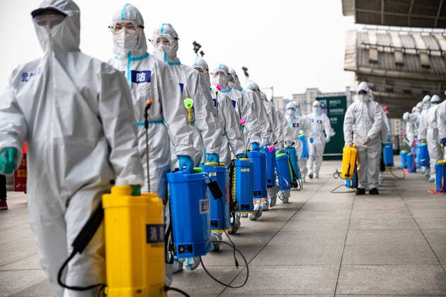 (200324) -- WUHAN, March 24, 2020 -- Firefighters gather to prepare for disinfection works at the Wuhan Railway Station in Wuhan, central China s Hubei Province, March 24, 2020. Over 70 firefighters conducted a comprehensive disinfection at the railway station on Tuesday. (Photo by Xinhua) CHINA-HUBEI-WUHAN-RAILWAY STATION-DISINFECTION (CN) HexHanqiu 