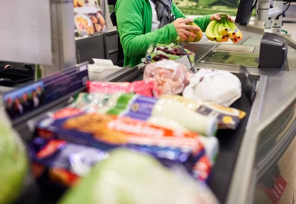 Supermarket in Marktoberdorf, March 24, 2020. A cashier in a grocery store remembers to keep distance between customers due to the Corona virus disease (COVID-19) on March 24, 2020 in Marktoberdorf, Germany