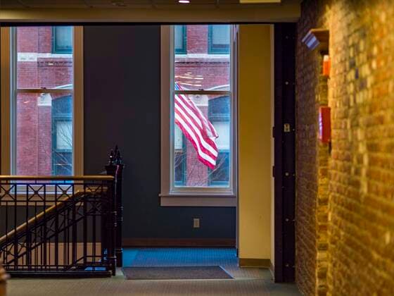 March 24, 2020, Des Moines, Iowa, U.S: The empty hallway of a Des Moines office building. On Tuesday morning, 24 March, Iowa reported over 120 confirmed cases of the Coronavirus (SARS-CoV-2) and COVID-19. Restaurants, bars, movie theaters, places that draw crowds are closed for at least 30 days. The Governor has not ordered shelter in place but several Mayors, including the Mayor of Des Moines, have asked residents to stay in their homes for all but the essential needs. People are being encouraged to practice social distancing and many businesses are requiring or encouraging employees to telecommute. Des Moines U.S. - ZUMAk94_ 20200324_zaf_k94_009 Copyright: xJackxKurtzx