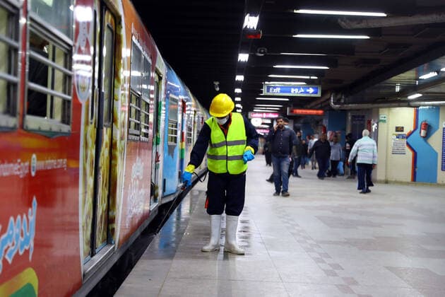 (200324) -- CAIRO, March 24, 2020 -- A man sprays disinfectant in a metro station in Cairo, Egypt, March 24, 2020. Egypt, a country with a population of 100 million people, has confirmed 366 COVID-19 cases, including 19 deaths. (Photo by Ahmed Gomaa Xinhua) EGYPT-CAIRO-METRO-COVID-19-MEASURES WuxHuiwo 