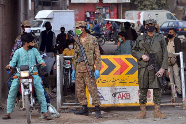 Pakistani army and ranger officials patrolling Pakistani army and ranger officials are patrolling high alert during the complete lockdown due to increasing coronavirus cases in country, as preventive measure against the spread of the Coronavirus (COVID- 19) in Lahore. Pakistan on Tuesday reported its seventh death from the novel coronavirus in the country and 16 new cases taking the nationwide toll of positive cases to 908. Pakistani authorities said they d shut down train, bus operations across the country until March 31 in an effort to contain the spread of the virus. Lahore Punjab Pakistan Copyright: RanaxSajidxHussain