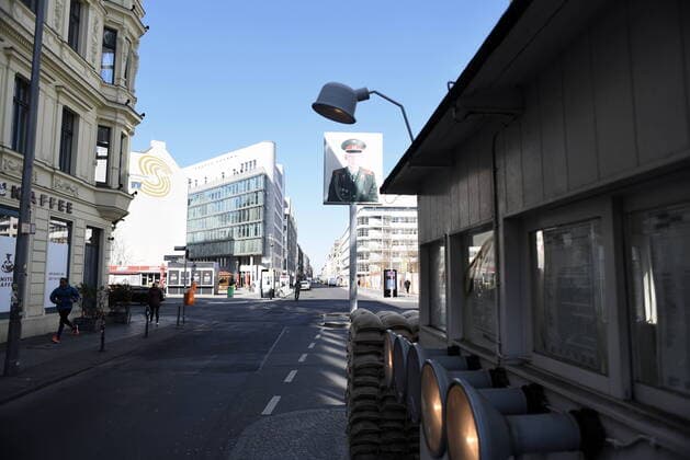 No tourists, no open restaurants at Checkpoint Charlie in Berlin Empty of people Chechpoint Charlie
